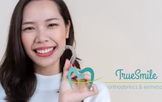 woman with clear aligners